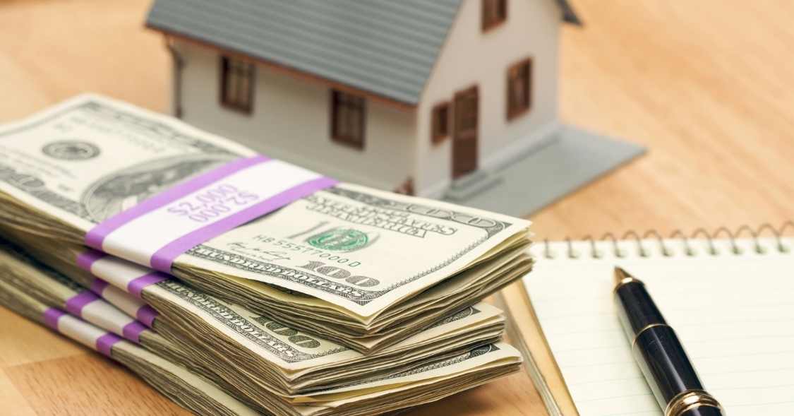 a%20stack%20of%20cash%20next%20to%20a%20home%20figurine a%20stack%20of%20cash%20next%20to%20a%20home%20figurine